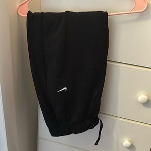 Nike joggers with zipper at ankle